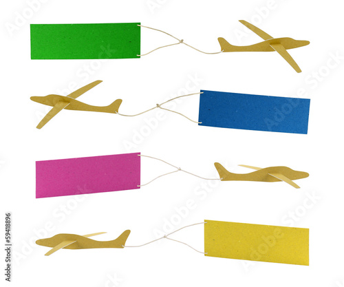 paper airplanes pulling colored banners photo