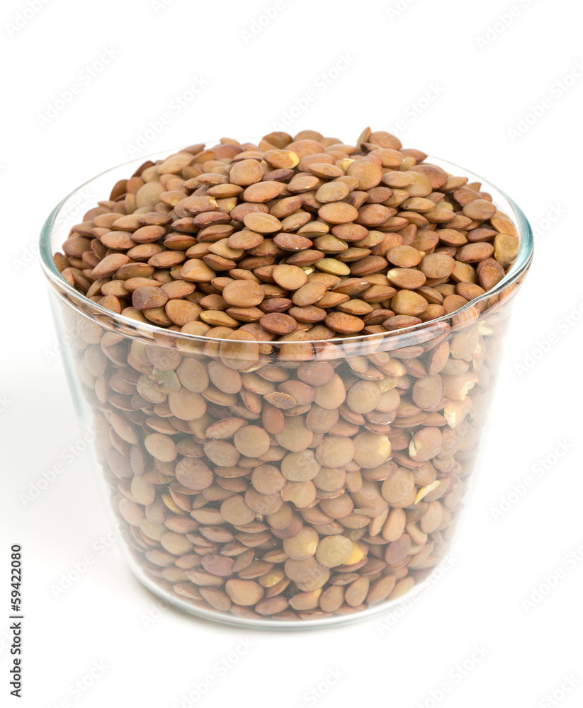 brown lentils in a glass bowl brown lentils in a glass bowl