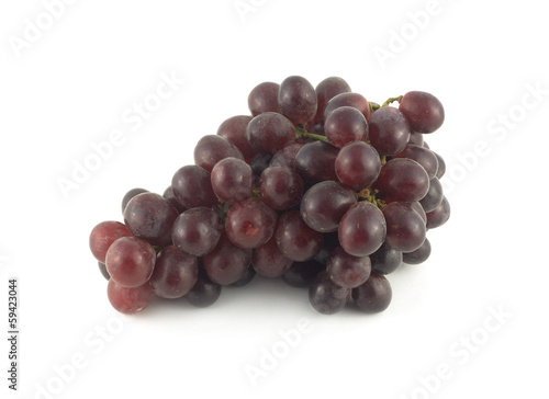 Red wine grape branch with tasty berries isolated closeup