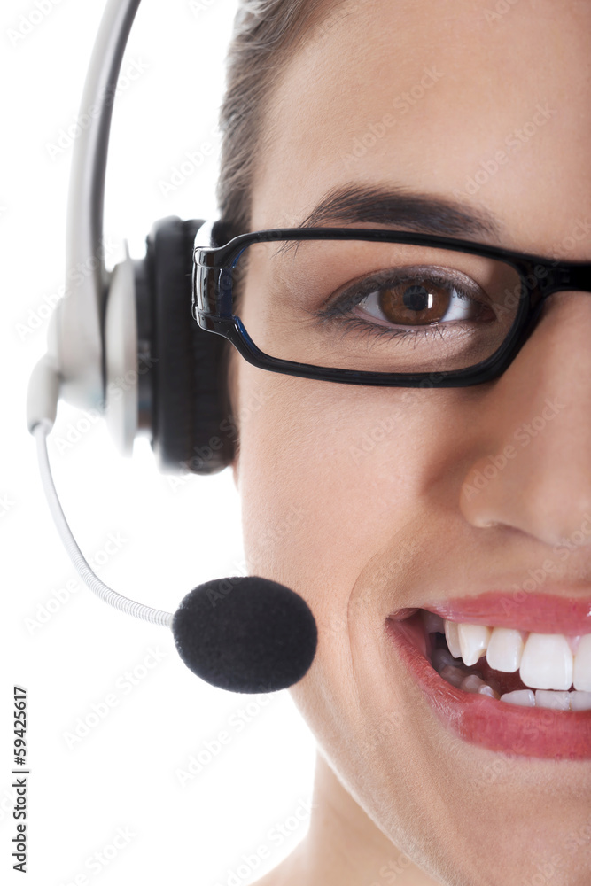 Beautiful woman's face with microphone and headphones. Beautiful woman's face with microphone and headphones.