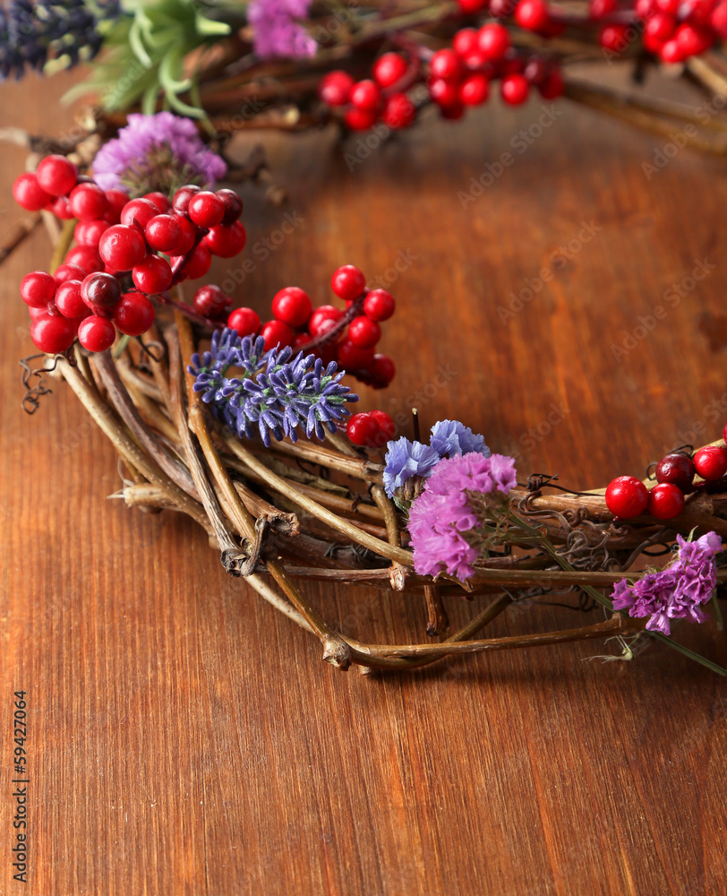 Wreath of dry branches with flowers and viburnum Wreath of dry branches with flowers and viburnum