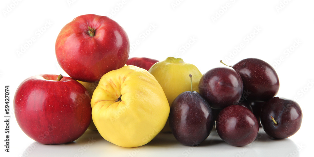 Quinces with apples and plums isolated on white Quinces with apples and plums isolated on white