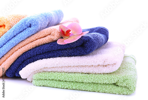 Fototapeta Naklejka Na Ścianę i Meble -  Orchid flower and towels, isolated on white