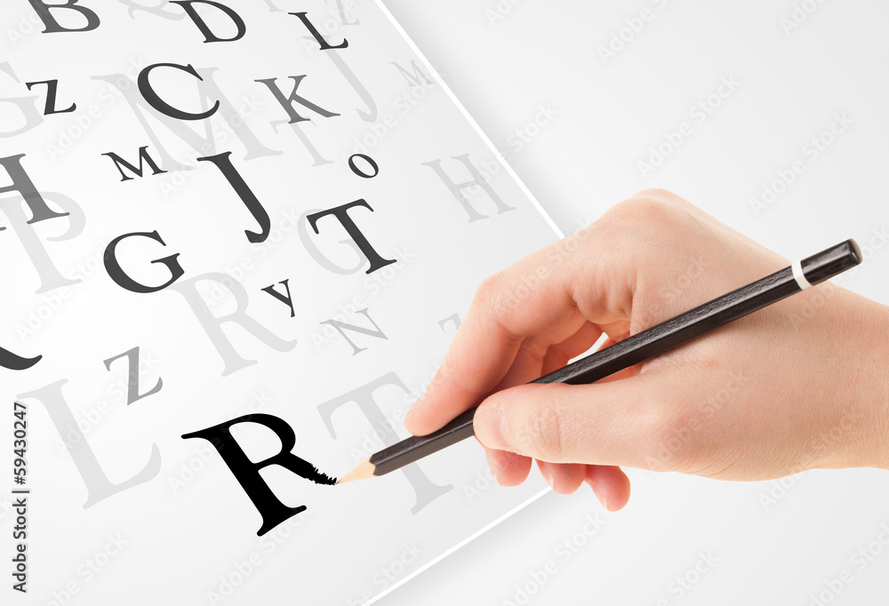 Hand writing various letters on white plain paper Hand writing various letters on white plain paper