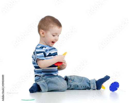 child boy playing with colo...