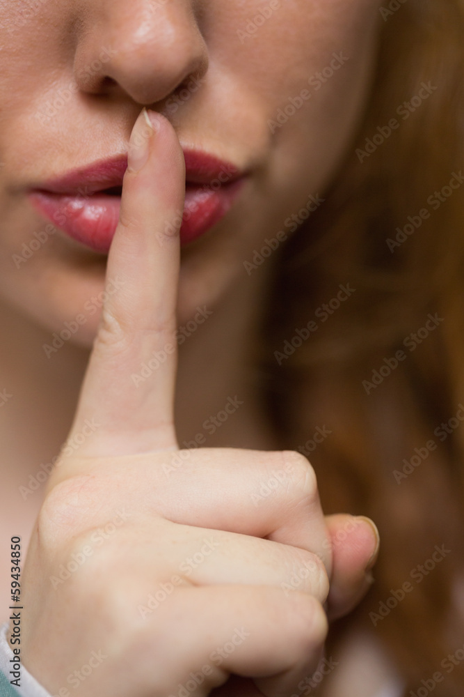 Redhead student asking for silence extreme close up Redhead student asking for silence extreme close up