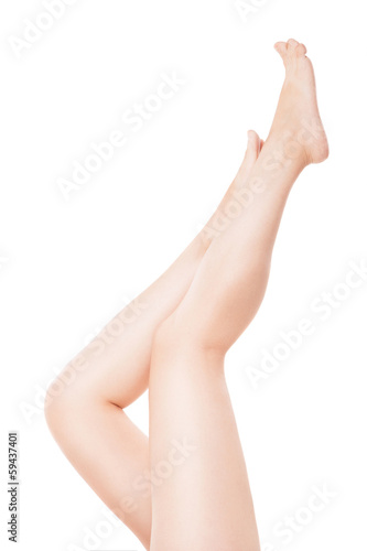 Beautiful woman legs isolated over white