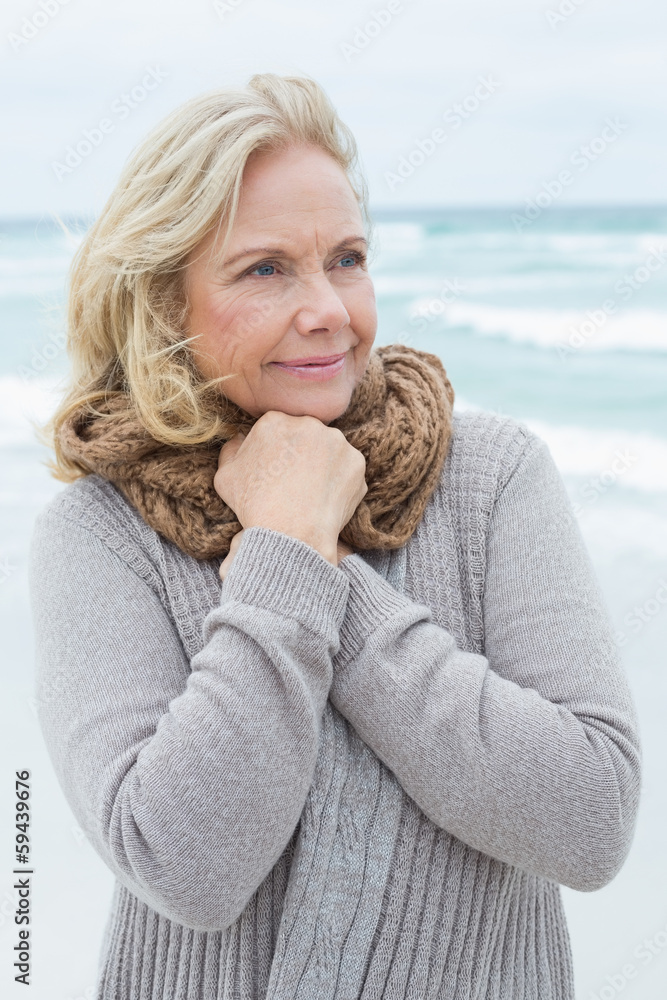 Senior woman looking away at beach Senior woman looking away at beach