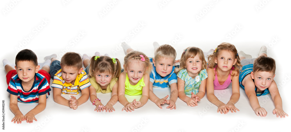Eight kids lying on floor