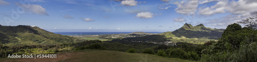 green valley view, ocean far in distance