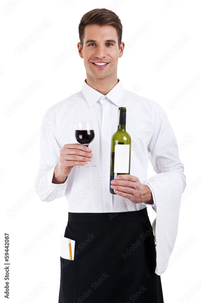 Portrait of a waiter holding a waine bottle Portrait of a waiter holding a waine bottle
