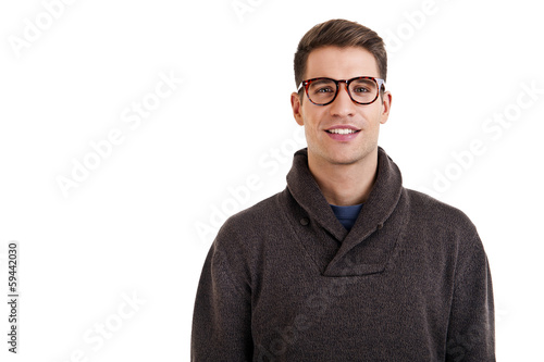Portrait of attractive male in casual clothes looking at camera © Wisiel