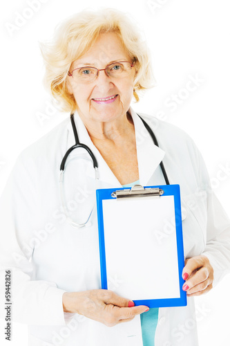 Senior Doctor Showing Clipboard With Blank Paper