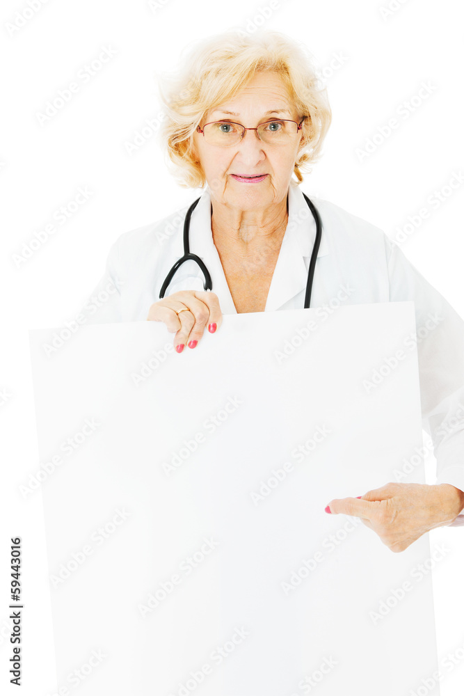 Senior Doctor Pointing At Blank Billboard Senior Doctor Pointing At Blank Billboard