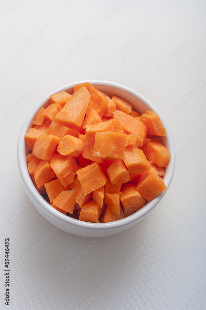 cut carrot on white cut carrot on white