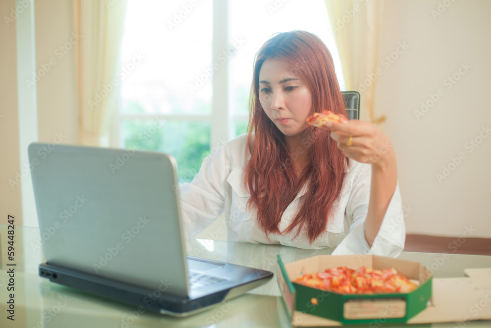young woman using laptop