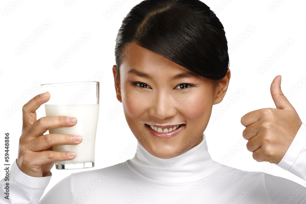 Young happy asian woman drink fresh milk Young happy asian woman drink fresh milk