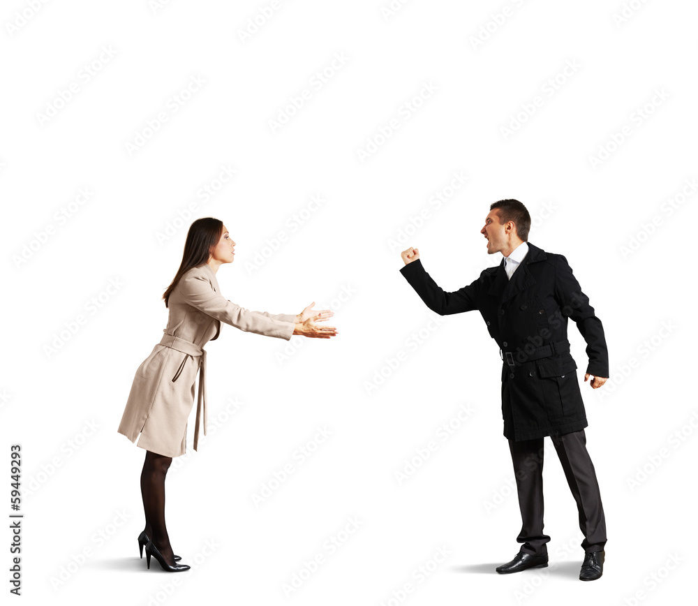 man at odds with young sad woman man at odds with young sad woman