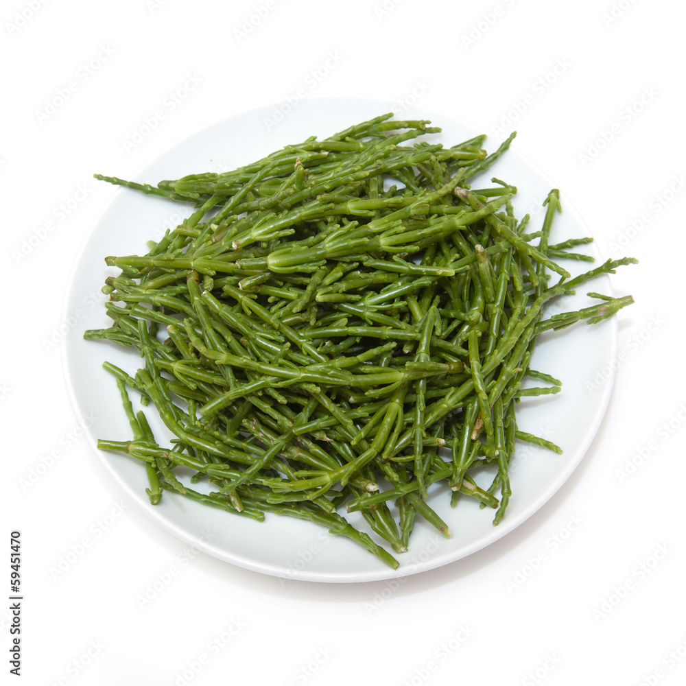 Plate of Samphire isolated on a white studio background. Plate of Samphire isolated on a white studio background.