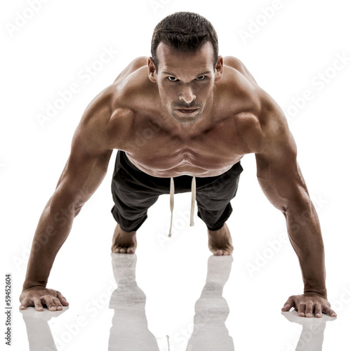 Muscle man making pushups