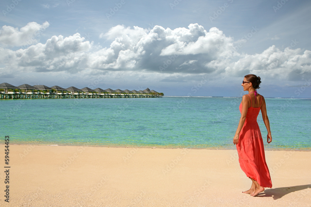 Tropical resort with a girl in a summer dress Tropical resort with a girl in a summer dress