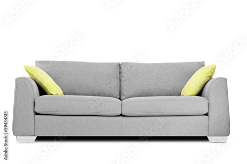 Studio shot of a modern couch with pillows photo