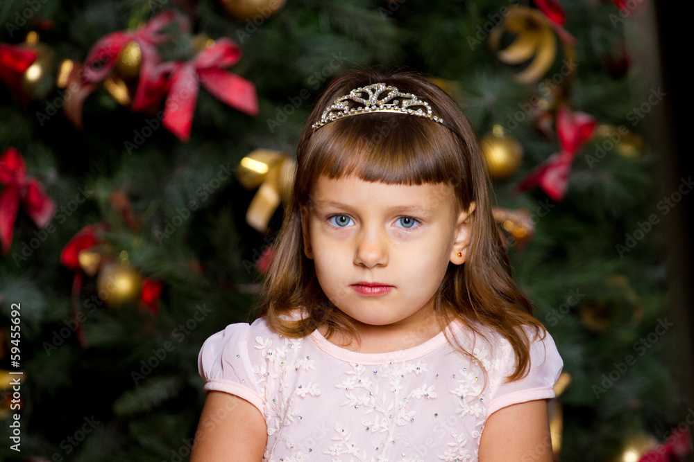 Girl in a Christmas tree. Girl in a Christmas tree.