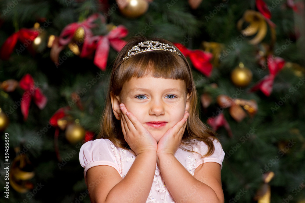 Girl in a Christmas tree. Girl in a Christmas tree.