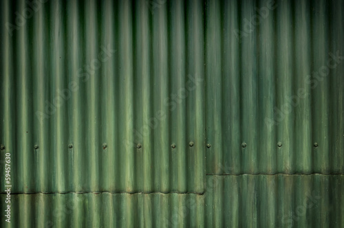Green multi-tone grunge corrugated wall with character