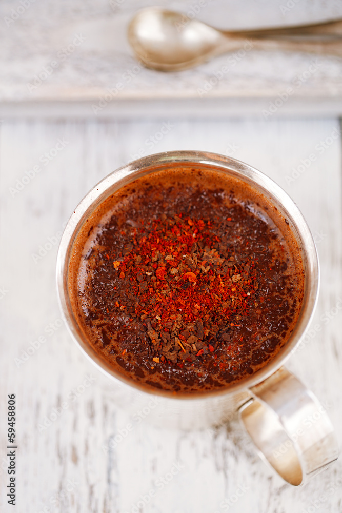 spiced red chillies hot chocolate on white table spiced red chillies hot chocolate on white table