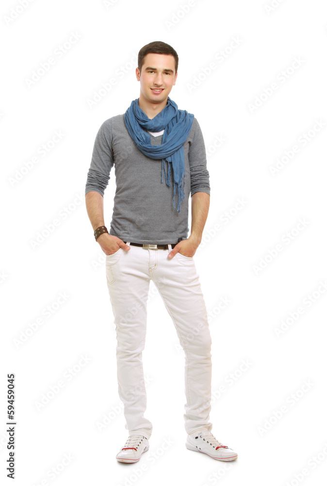 Fototapeta premium A full-length portrait of a young handsome guy