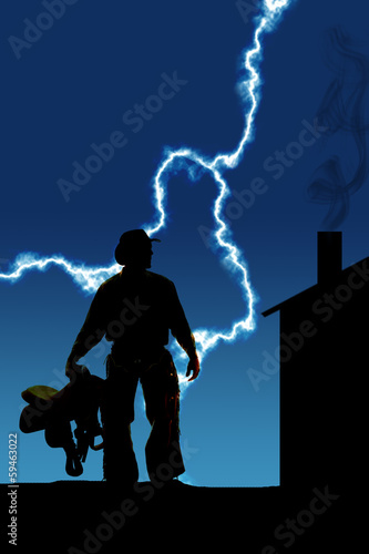 Silhouette man holding a saddle by side lightning cabin