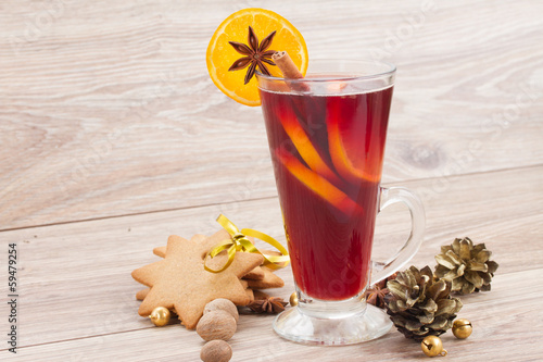 mulled red  wine on wooden table photo