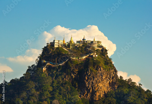 Canvastavla temple on top of a mountain Popa in the clouds, Myanmar