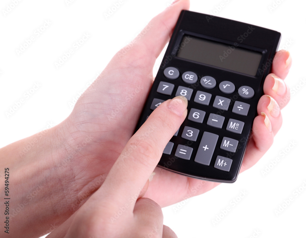 Female hands holding digital calculator isolated on white Female hands holding digital calculator isolated on white