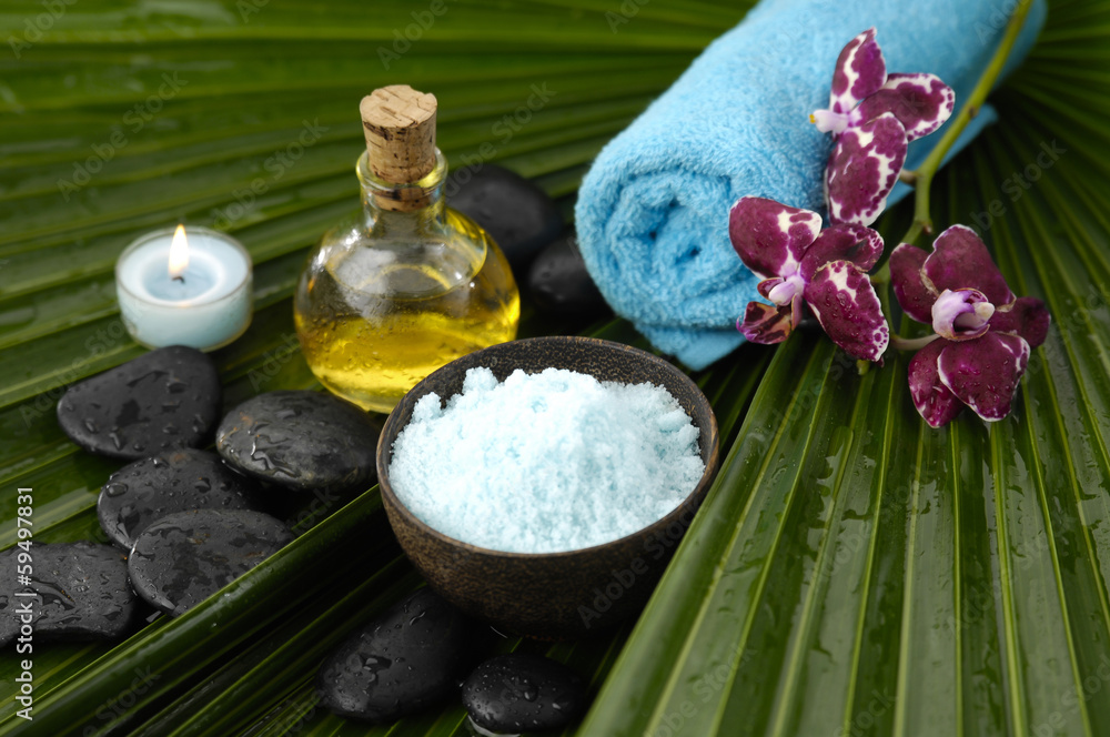 tropical spa on wet palm leaf tropical spa on wet palm leaf