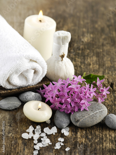 salt ,massage oil ,stones ,towel ,towel on old wood