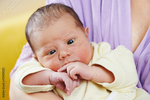 squint of newborn baby photo