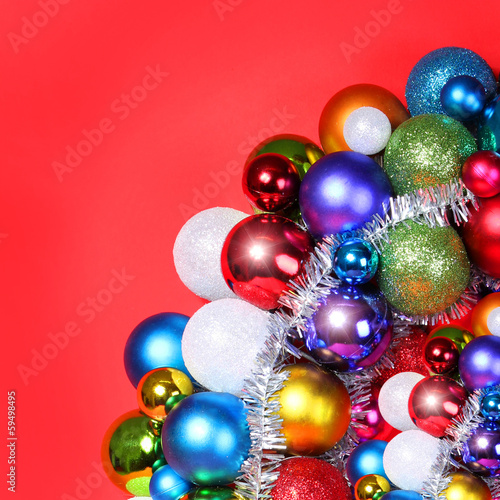 Christmas Balls. Colorful Christmas Decorations over red