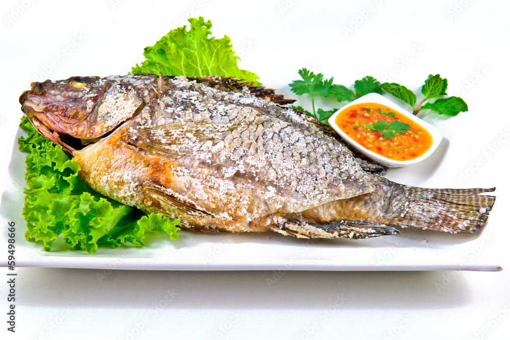 Tilapia grilled on white dish