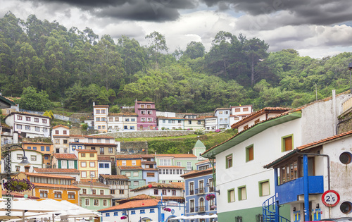 Fishing village of Cudillero in Spain with its surrounding fores