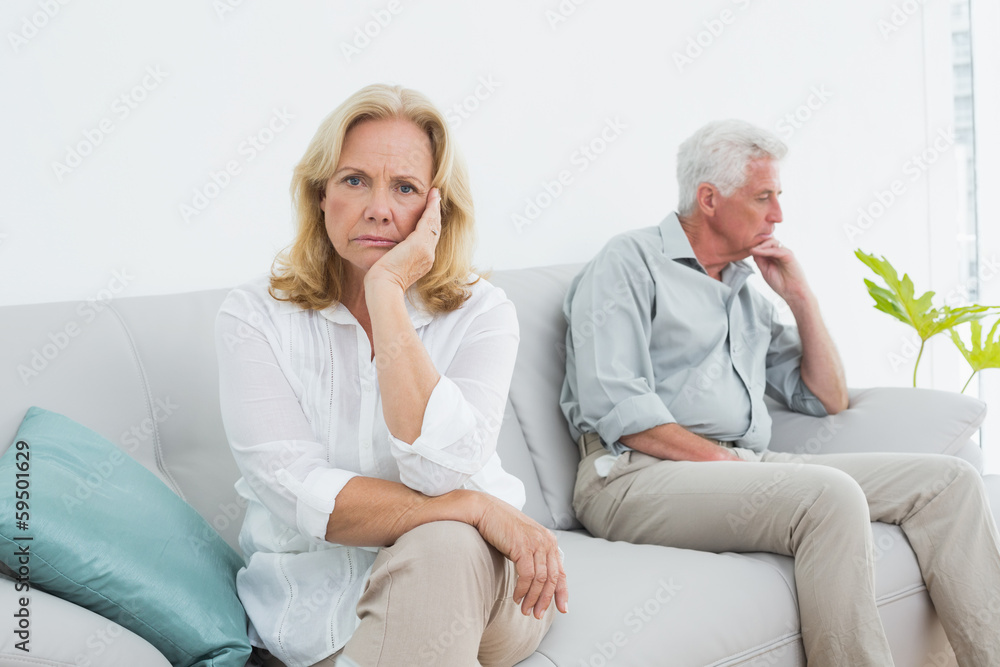 Displeased relaxed senior couple at home Displeased relaxed senior couple at home