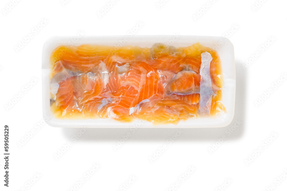 Salt Humpback Salmon (Oncorhynchus gorbuscha) slices in a foam tray, isolated on white background Salt Humpback Salmon (Oncorhynchus gorbuscha) slices in a foam tray, isolated on white background