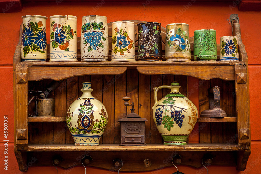 Various ceramic traditional pottery lined up for sale. Various ceramic traditional pottery lined up for sale.