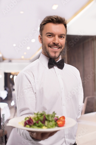 Cheerful waiter.