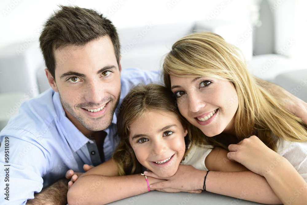 Portrait of happy family at home