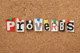 The word Proverbs on a cork notice board