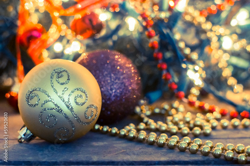 Christmas decorative golden ornaments in lights - wreath on the