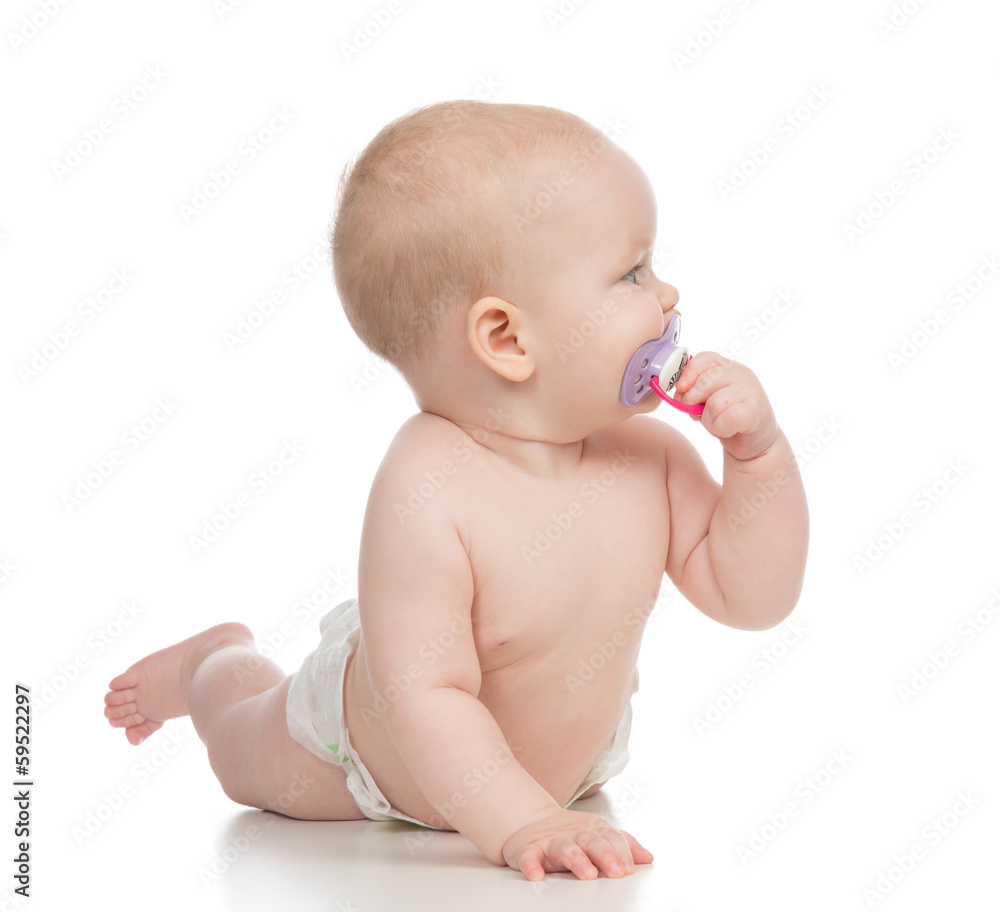 5 month child girl lying happy holding baby nipple soother 5 month child girl lying happy holding baby nipple soother