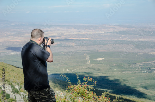 Man taking a picture in the Moncayo